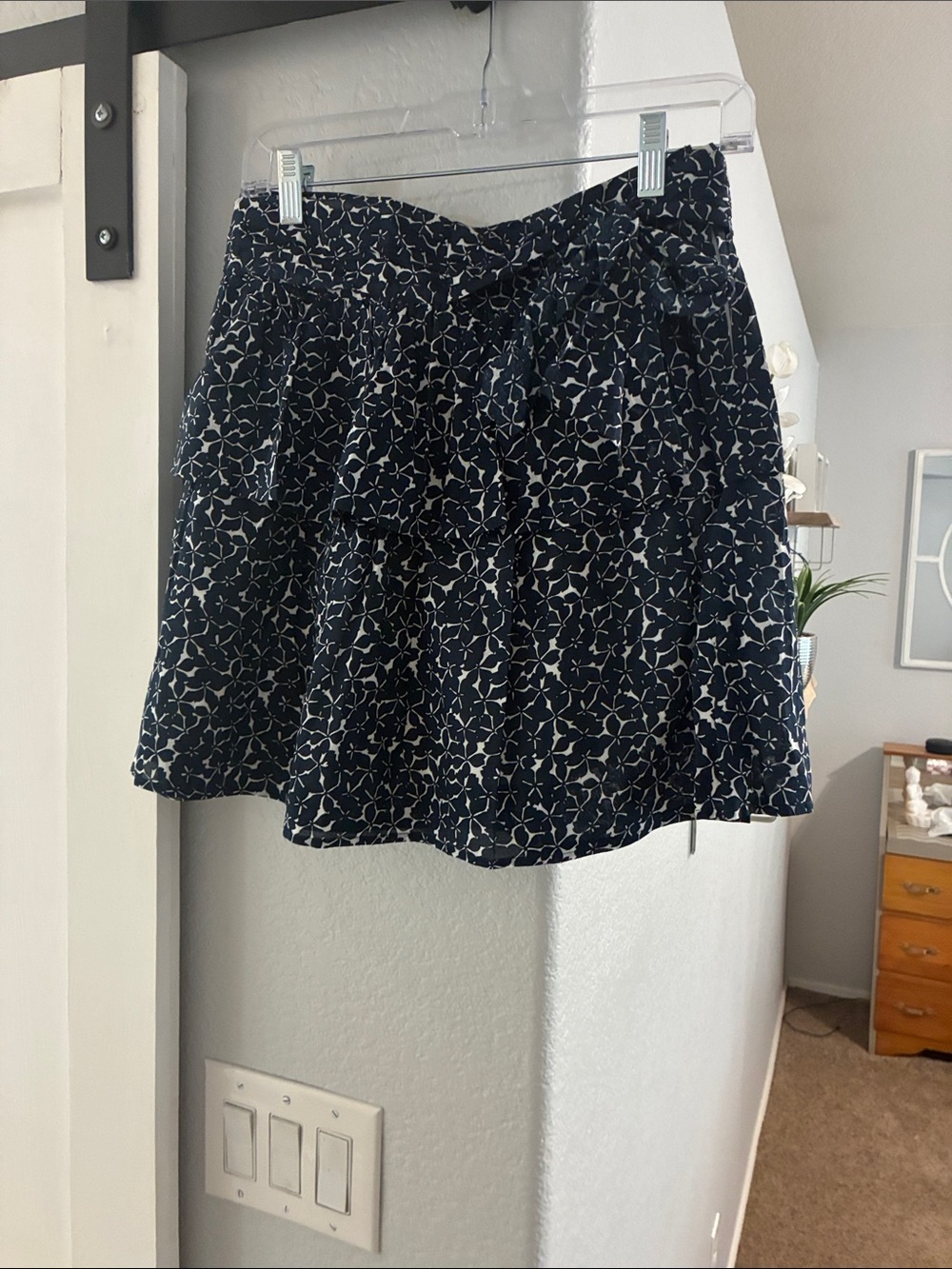 NWOT!! NAF NAF Navy Mini Skirt with White Floral Print and Waist Tie